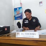 Drs. Tomi Romli Kades Samarang Drs. Tomi Romli Kades Samarang
